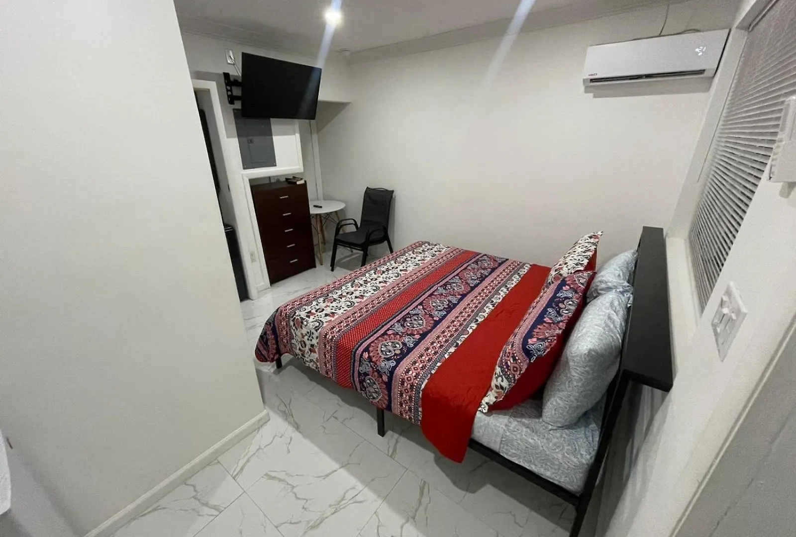 Sandelwood Studios' Nassau Aparthotel